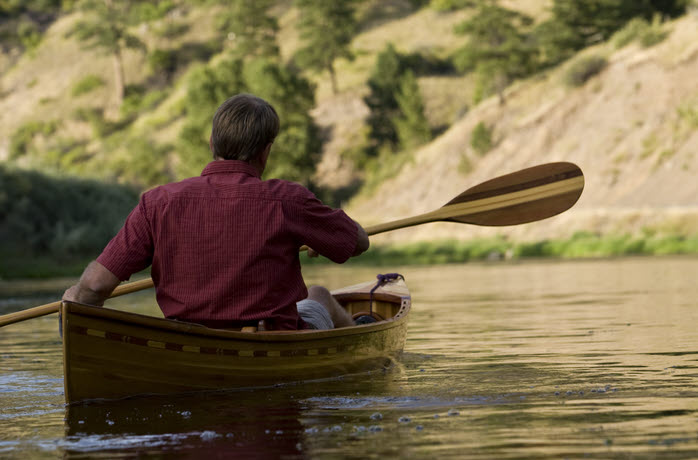Paddling Missouri River in Wood Canoe